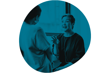 lady talking to a colleague about planning her retirement