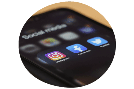 Social media app icons on a mobile phone