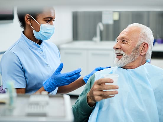 dental nurse talking to patient