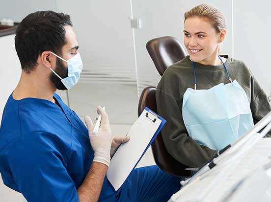 Dentist explaining procedure to patient